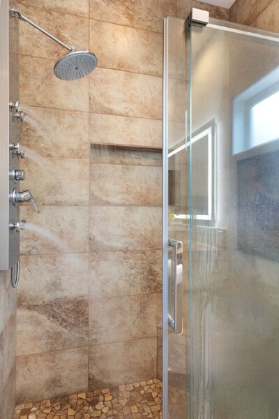full bathroom featuring a stall shower