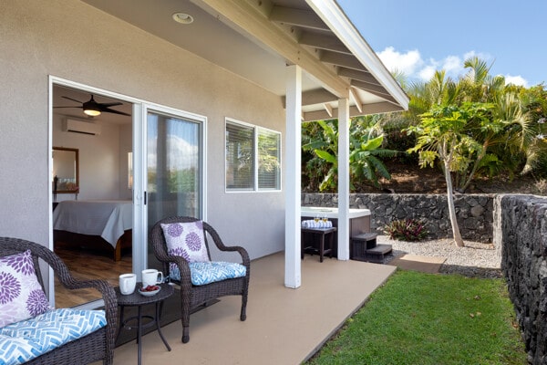 view of patio / terrace with an AC wall unit