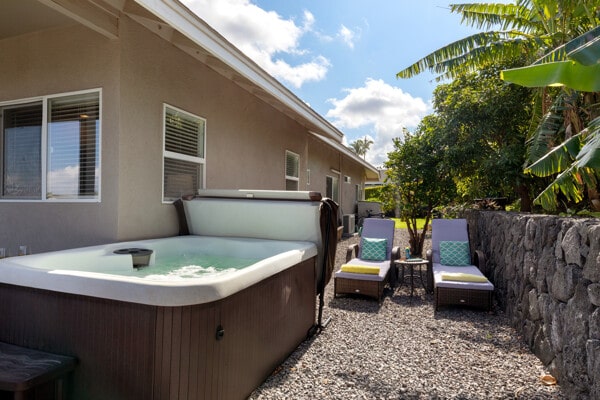 view of patio / terrace with a hot tub