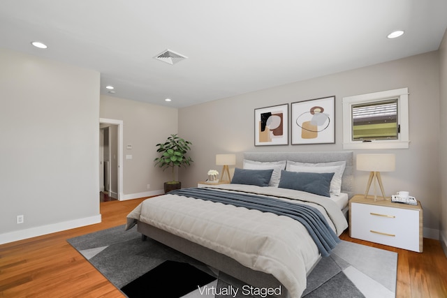 2326 Wiliko St, Lihue, HI 96766 - bedroom with baseboards, recessed lighting, wood finished floors, and visible vents