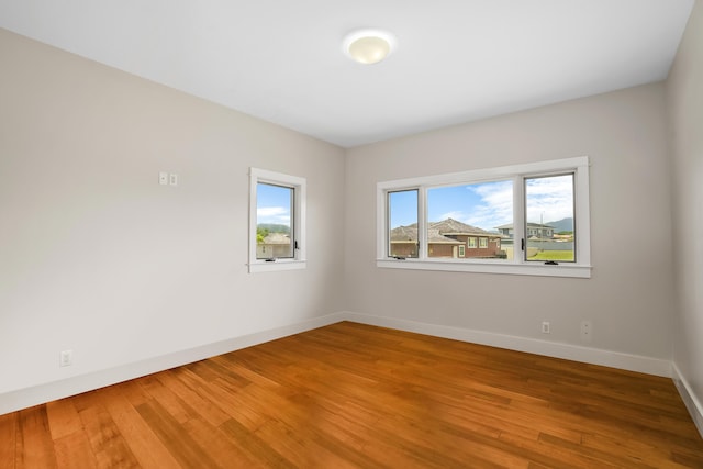 2326 Wiliko St, Lihue, HI 96766 - empty room featuring baseboards and light wood-type flooring