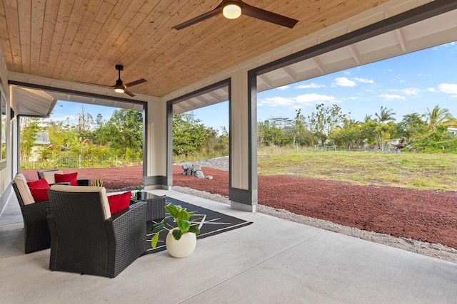 view of patio / terrace featuring ceiling fan