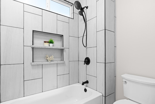 bathroom with toilet and shower / bathtub combination
