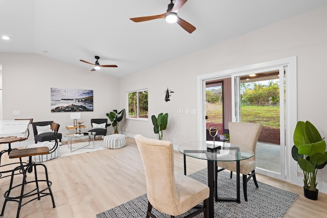 dining space featuring lofted ceiling, ceiling fan, light wood-style floors, recessed lighting, and baseboards