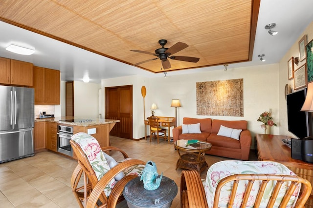 living room with a ceiling fan, light tile patterned floors, and wood ceiling
