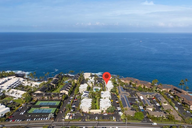 drone / aerial view with a water view