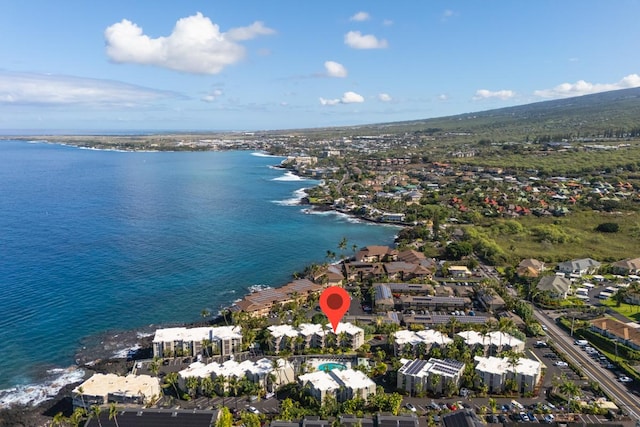 drone / aerial view with a water view and a residential view