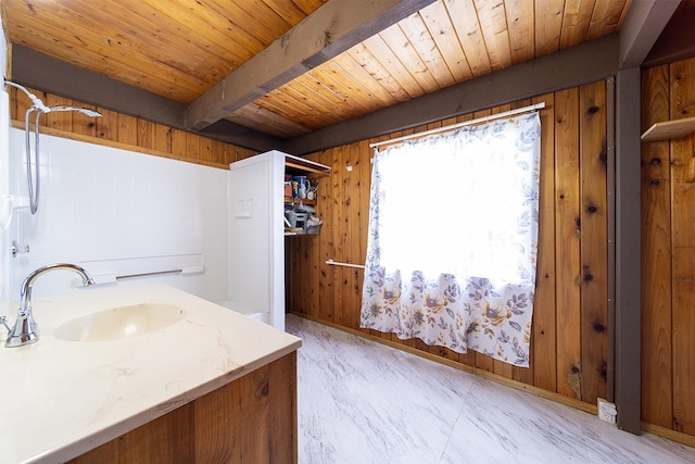 15-1429 22nd Ave, Keaau, HI 96749 - bathroom with wooden ceiling with exposed beams, wood walls, vanity, and marble finish flooring
