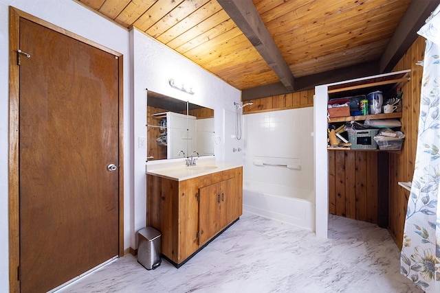 15-1429 22nd Ave, Keaau, HI 96749 - full bathroom with wooden ceiling with exposed beams, vanity, marble look tile flooring, washtub / shower combination, and wood walls
