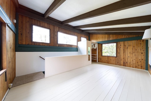15-1429 22nd Ave, Keaau, HI 96749 - spare room with beam ceiling, wooden walls, and wood finished floors