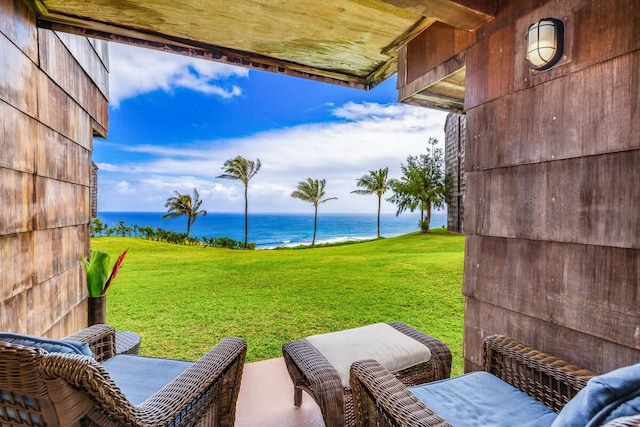 view of patio featuring a water view