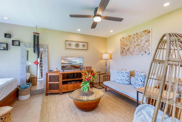 tiled living area with recessed lighting and a ceiling fan
