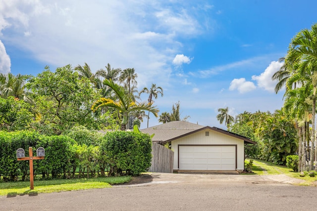 view of front of property featuring fence