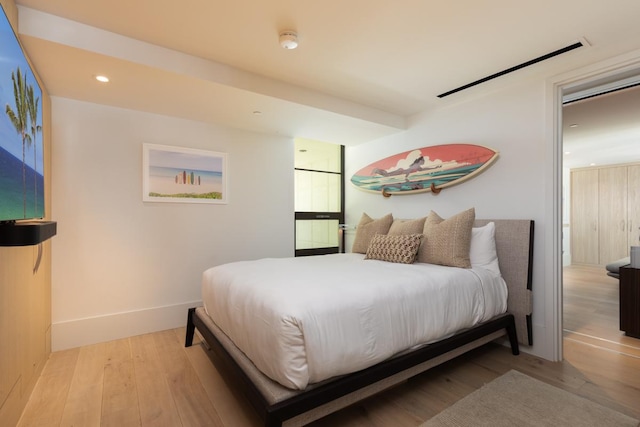 66-84 Kaunaoa Dr Unit A21, Kamuela, HI 96743 - bedroom with wood finished floors, recessed lighting, and baseboards