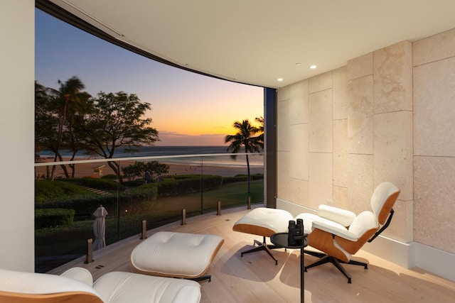 66-84 Kaunaoa Dr Unit A21, Kamuela, HI 96743 - living area featuring wood finished floors, a water view, and recessed lighting
