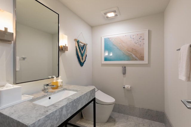 66-84 Kaunaoa Dr Unit A21, Kamuela, HI 96743 - bathroom with marble finish floors, toilet, baseboards, and vanity