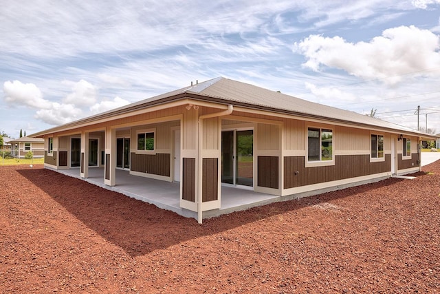 rear view of house with a patio area