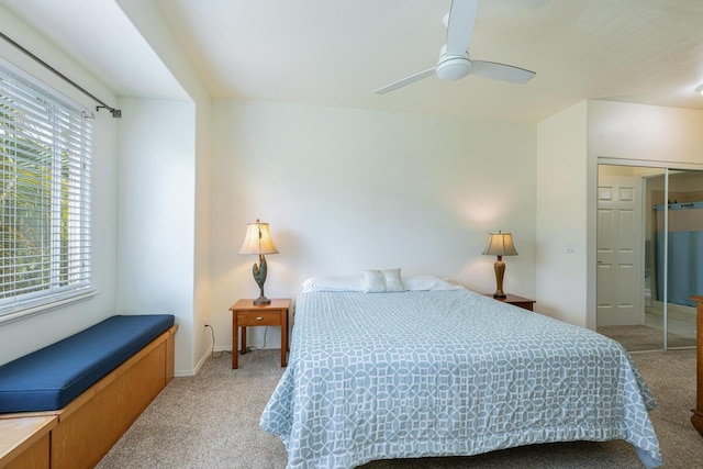 2110 Kaneka St Unit 73, Lihue, HI 96766 - bedroom featuring multiple windows, light carpet, a ceiling fan, and a closet