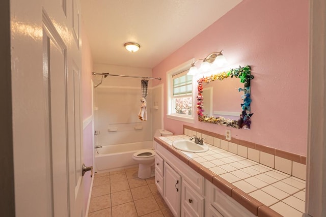 full bathroom featuring vanity, toilet, bathtub / shower combination, and tile patterned flooring