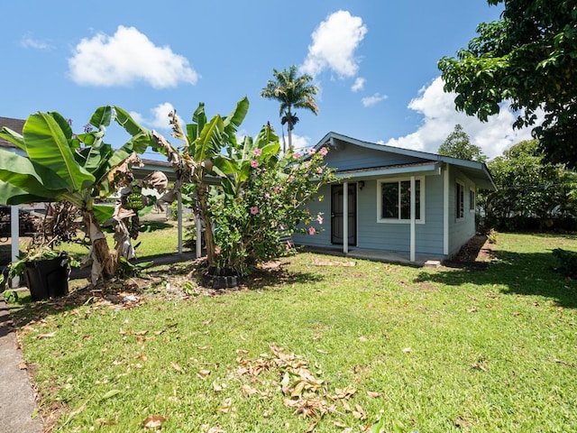 view of front of house with a porch and a front yard