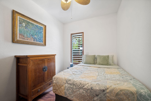 4429-A Kaluamakua Pl, Kilauea, HI 96754 - bedroom with ceiling fan and dark wood-type flooring