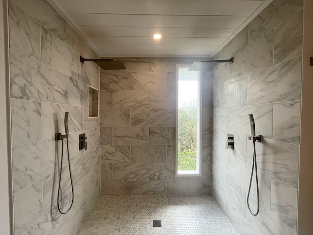 full bathroom with tiled shower