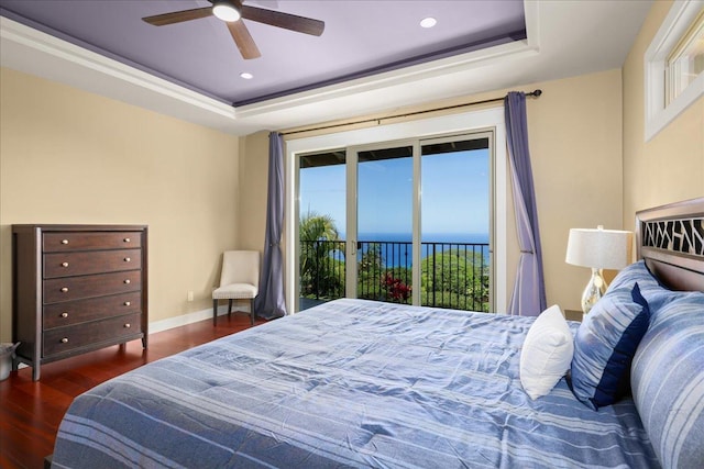 77-155 Kalaniuka St, Holualoa, HI 96725 - bedroom featuring baseboards, wood finished floors, a tray ceiling, and access to exterior