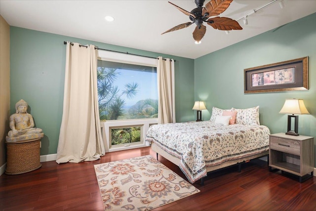 77-155 Kalaniuka St, Holualoa, HI 96725 - bedroom with recessed lighting, rail lighting, multiple windows, and wood finished floors