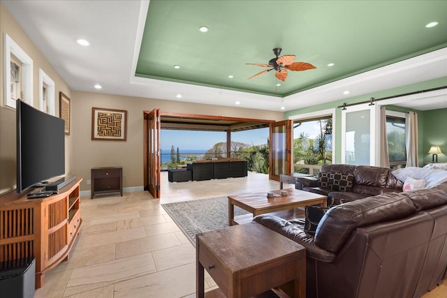 77-155 Kalaniuka St, Holualoa, HI 96725 - living area with recessed lighting, ceiling fan, baseboards, and a raised ceiling