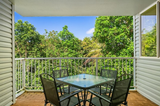 3811 Edward Rd Unit 1206, Princeville, HI 96722 - balcony featuring outdoor dining area
