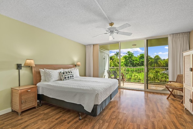 3811 Edward Rd Unit 1206, Princeville, HI 96722 - bedroom featuring floor to ceiling windows, access to exterior, wood finished floors, a textured ceiling, and ceiling fan