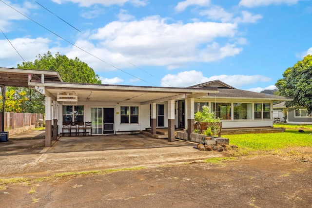 242 Koili Ln, Kapaa, HI 96746 - back of property with a patio area and fence