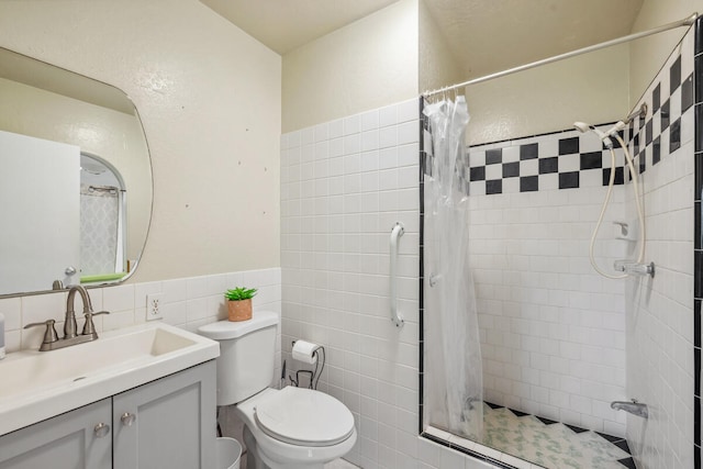 242 Koili Ln, Kapaa, HI 96746 - full bath with vanity, toilet, tile walls, and a shower stall