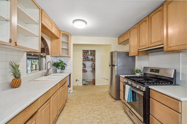 242 Koili Ln, Kapaa, HI 96746 - kitchen with light countertops, decorative backsplash, stainless steel appliances, and a sink