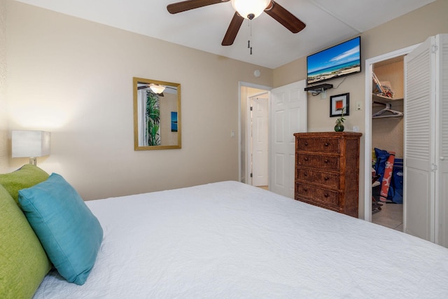 bedroom with a closet and a ceiling fan