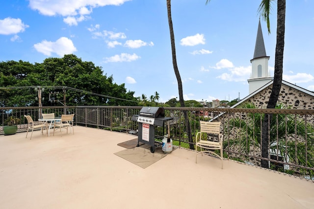 view of patio featuring a grill and outdoor dining area