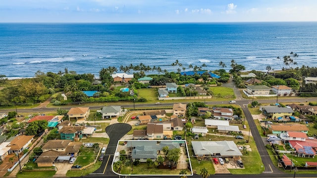 birds eye view of property featuring a water view and a residential view