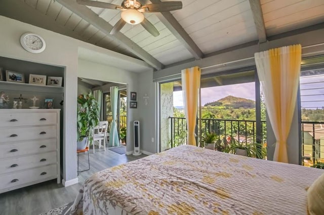3-3400 Kuhio Hwy Unit B406, Lihue, HI 96766 - bedroom with access to outside, beamed ceiling, wood finished floors, baseboards, and wooden ceiling