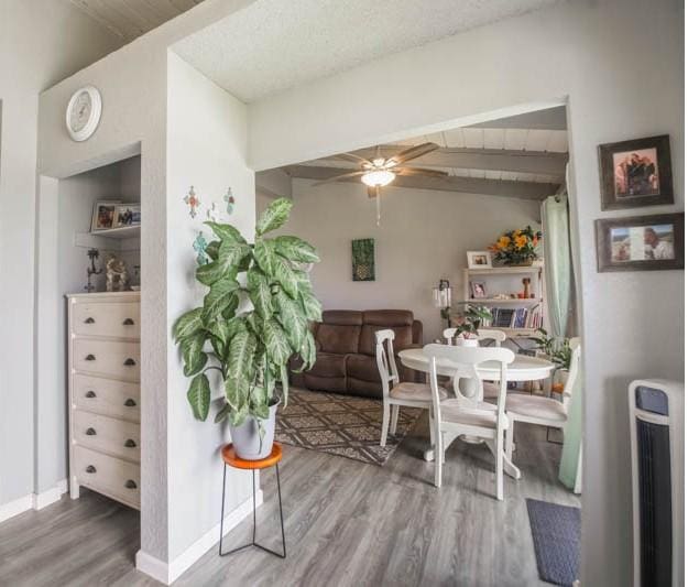 3-3400 Kuhio Hwy Unit B406, Lihue, HI 96766 - dining space with wood finished floors, a ceiling fan, and baseboards