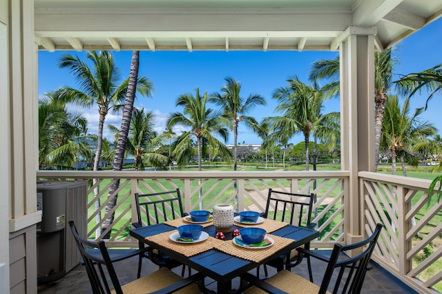 69-200 Pohakulana Pl Unit J33, Waikoloa, HI 96738 - balcony with central AC unit and outdoor dining space