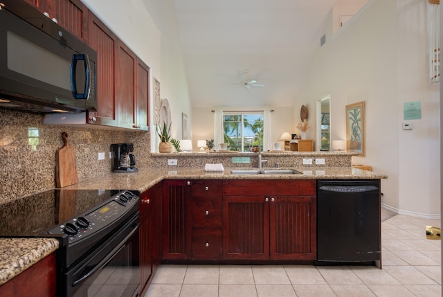 69-200 Pohakulana Pl Unit J33, Waikoloa, HI 96738 - kitchen with black appliances, a sink, dark brown cabinets, decorative backsplash, and a peninsula