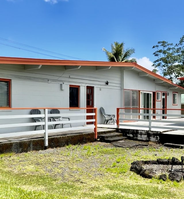 view of front of house with a deck