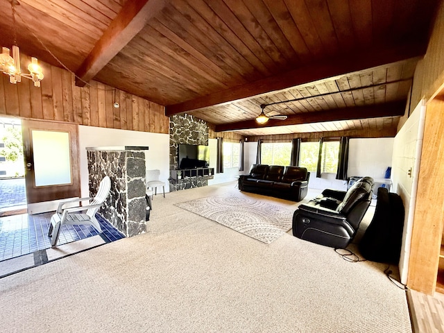 carpeted living room featuring wood ceiling, ceiling fan with notable chandelier, and vaulted ceiling with beams