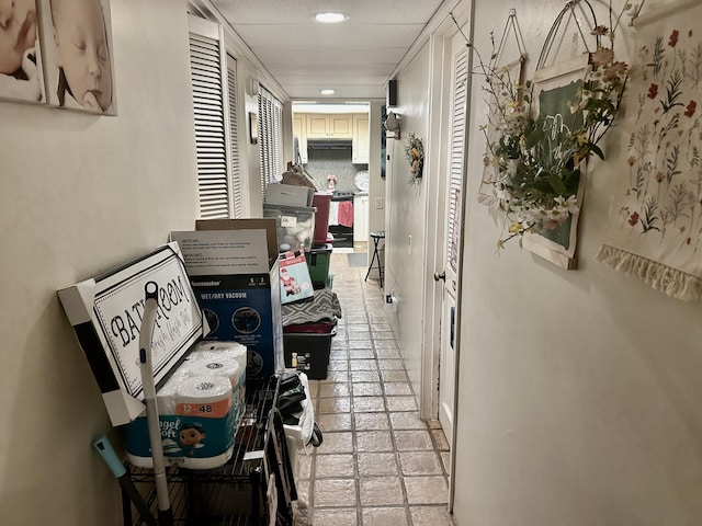 corridor with recessed lighting