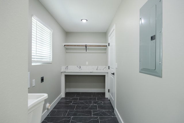 16-2074 Sandalwood Dr, Pahoa, HI 96778 - clothes washing area with electric panel, hookup for an electric dryer, baseboards, and dark marble finish flooring