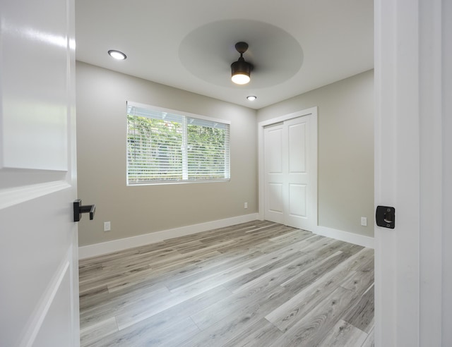 16-2074 Sandalwood Dr, Pahoa, HI 96778 - unfurnished bedroom featuring light wood-style floors, a closet, ceiling fan, baseboards, and recessed lighting