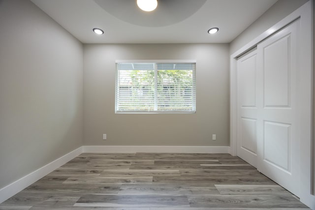 16-2074 Sandalwood Dr, Pahoa, HI 96778 - unfurnished bedroom featuring light wood-style floors, baseboards, and recessed lighting
