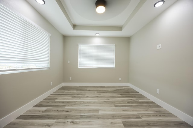 16-2074 Sandalwood Dr, Pahoa, HI 96778 - spare room featuring recessed lighting, light wood-style floors, a raised ceiling, and baseboards