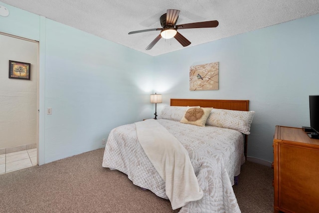 bedroom featuring carpet flooring and a ceiling fan