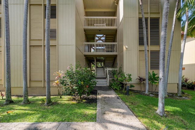 view of property featuring stairway